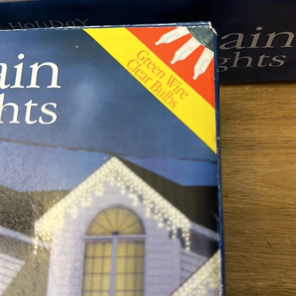 HOLIDAY TIME clear curtain lights 300 ct. 2 pck